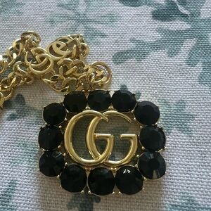 Elegant Black and Gold Pendant Necklace